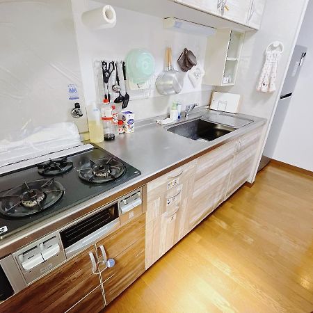 Osaka Sinsei Guest House Daikokukan Bagian luar foto