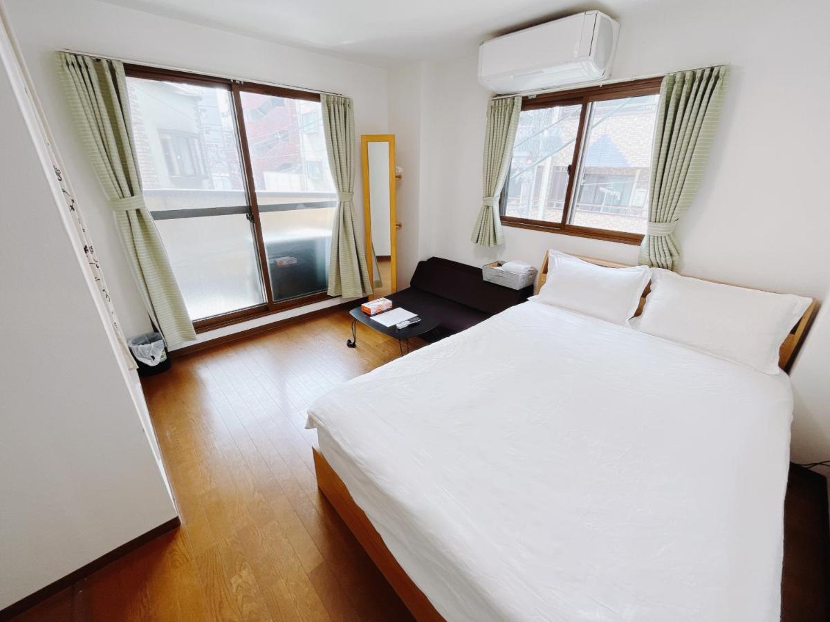 Osaka Sinsei Guest House Daikokukan Bagian luar foto