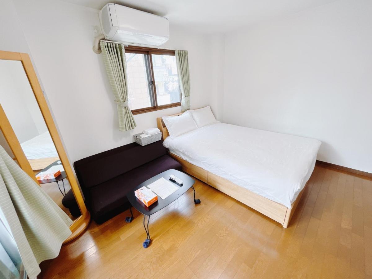 Osaka Sinsei Guest House Daikokukan Bagian luar foto