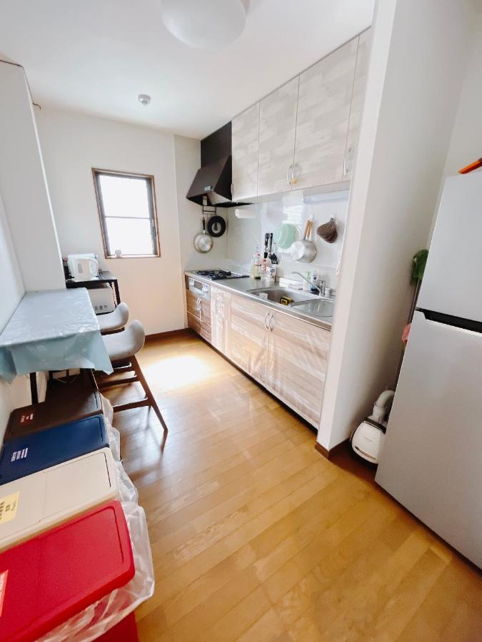 Osaka Sinsei Guest House Daikokukan Bagian luar foto