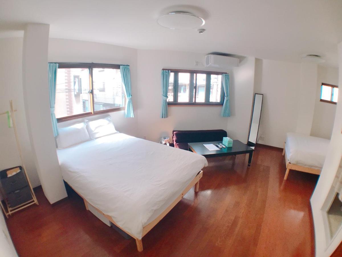 Osaka Sinsei Guest House Daikokukan Bagian luar foto