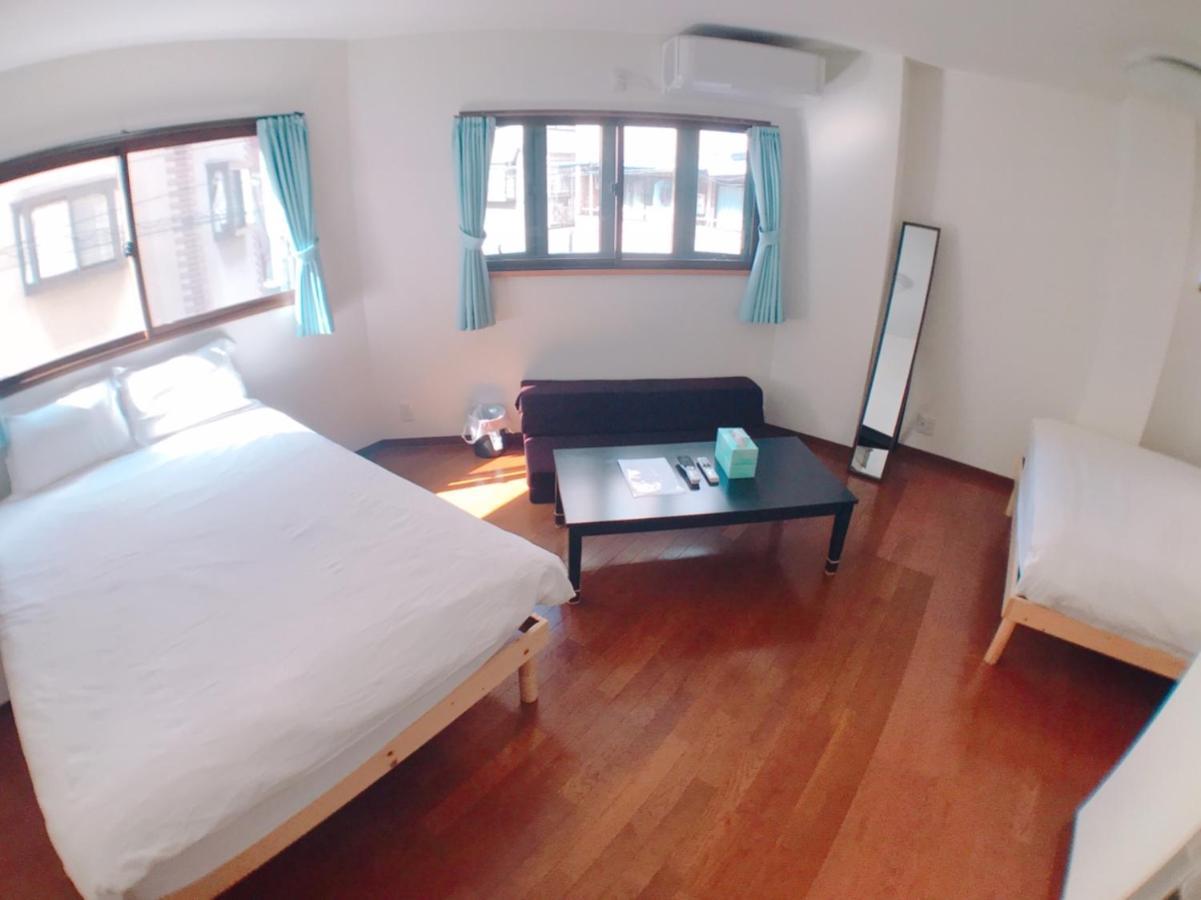 Osaka Sinsei Guest House Daikokukan Bagian luar foto